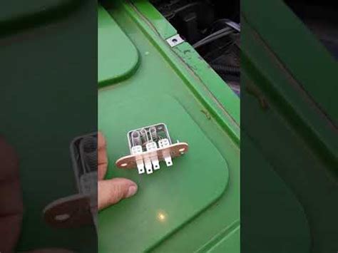 Remove the seat and panel under the seat for access. . John deere 8400 blower motor location